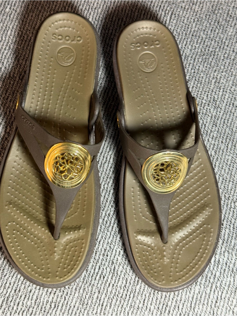 CROCS Brown Sandal with Gold Medallion Accent